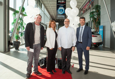 Bruno-Pierre Gougeon, owner of the 2 Millionth Mazda sold in Canada stands with Rania Guirguis, Mazda Dealer Business Manager, Quebec West, Denis Leclerc, owner of Albi Le Géant Mazda, and Jacques Parent, Mazda Regional Manager, Quebec West. (CNW Group/Mazda Canada Inc.)