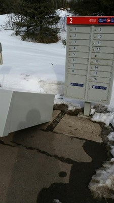 Fallen mailbox in Thunder Bay, Ontario. (CNW Group/Canadian Union of Postal Workers)