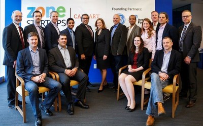 Calgary Mayor Naheed Nenshi, Elyse Allan, president and CEO of GE Canada and local startup companies are excited to innovate at the new Zone Startups Calgary, a partnership between GE Canada and Ryerson Futures to accelerate startup growth in Alberta. (CNW Group/GE Canada)