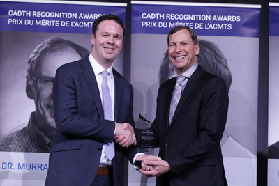 Dr. Nick Bansback receives the Maurice McGregor Award at the 2016 CADTH Symposium from Dr. Brian O'Rourke, President and CEO, CADTH. (CNW Group/Canadian Agency for Drugs and Technologies in Health (CADTH))